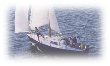 A group of people on a sailboat in the water
Description automatically generated with medium confidence